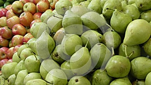 Close up of a display of fruit on a market stall.