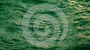 Close up of disturbed green ocean water surface