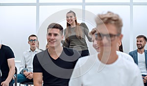 Close up. diverse young participants of the workshop, applauded in unison