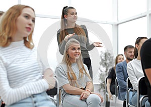 Close up. diverse young participants of the workshop, applauded in unison