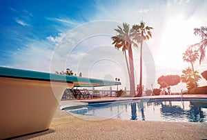 Close-up of a diving board for swimming pool with sunset light