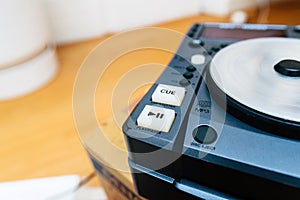 Close-Up of DJ Equipment wiuth CU play and pause buttons