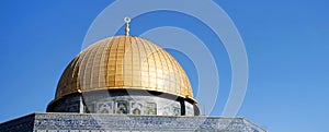 Close up of the Dome of the Rock on the Temple Mount in the Old City of Jerusalem Israel. Golden dome of a temple with walls