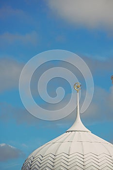 Close up of the dome of white mosque