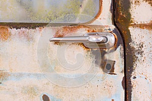 Door handle of old rusty truck