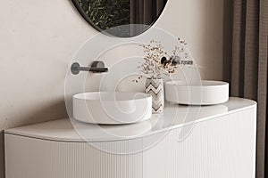 Close up of double sink with oval mirror standing in on beige wall , vanity with black faucet in minimalist bathroom.Side