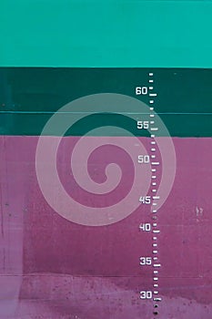 Close-up of the draft marks of a ship