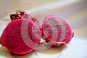 Close up the dragon fruit that was cut with white background