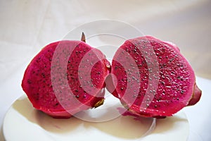 Close up the dragon fruit that was cut with white background