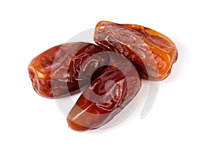 Close up of dried date palm fruit  isolated on white