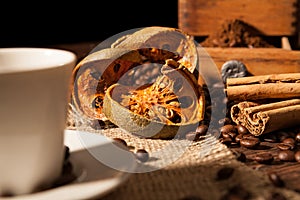 Close-up on dried orange fruit and cinnamon sticks