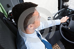 Close up of driver driving passenger bus