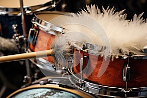 close-up of drumsticks on a custom drum set