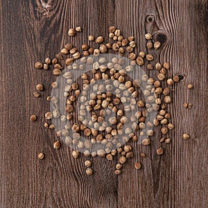 Close-up, Dry cardamom spice on wooden background, Top view