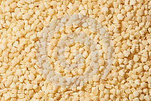 Close-up of dry pasta without eggs, tarhonya. Texture. Background