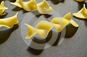 Close up of dry uncooked egg noodles
