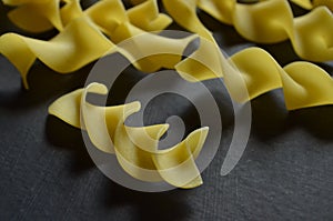 Close up of dry uncooked egg noodles