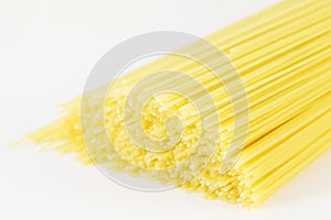 Close up of dry uncooked spaghetti lie