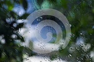 Close up dry water stains on the glass window, water drops of rain on a window glass