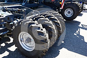 A close-up on dual wheel setup, dual tire of agricultural tractors, farm equipment