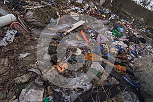 Close up dumping of waste in forest concept photo