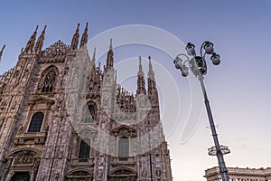 Close up of Duomo di Milano church in the early morning during sunrise, Milan Italy