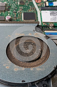 Close-up of dusty laptop cooling fan