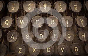 A close up of a dusty old typewriter keyboard