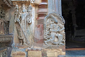 Close up of dwarapala and Hanumana, on the left side of the South entrance, Chennakesava temple, Belur, Karnataka.