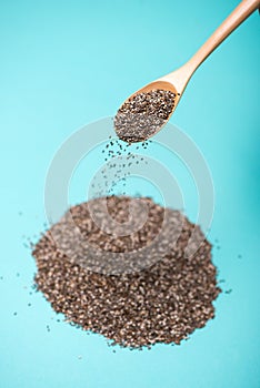 Close-up of ealthy chia seeds in a spoon. Text space.