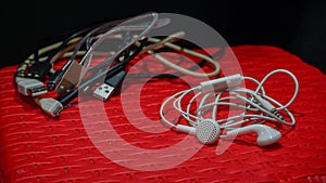 Close up of earphones and USB cable