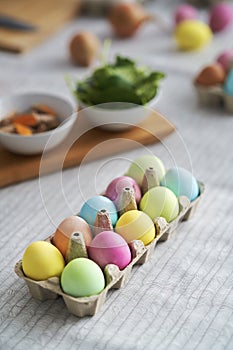 Top view of Easter eggs carton on the table