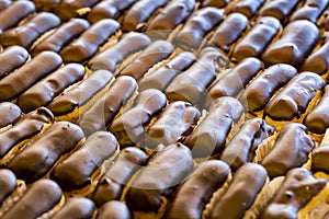 Close-up fresh eclairs cake. Freshly made eclair cake in tray