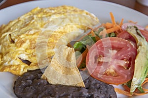 Close up egg, bean and salad breakfast