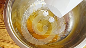 Close up of egg whisked with a electric mixer