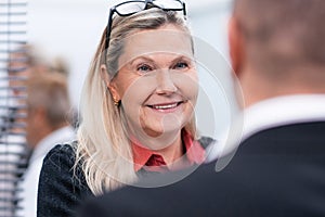 Close up. elderly businesswoman talking to her colleague