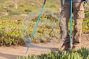 Close-up of elderly man hiking on sunny day