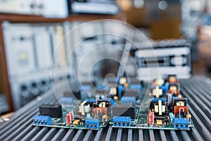 Close-up electric green embedded microcircuits in production