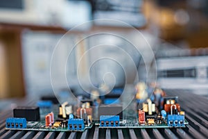 Close-up electric green embedded microcircuits in production