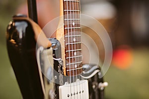 Close up of electric guitar. Detail of the strings.