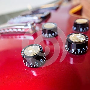 Close up of electric guitar volume knob