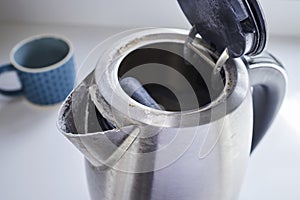 Close Up Of Electric Kettle With Limescale In Hard Water Area photo