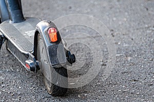 Close-up of electric scooter on the road. Future urban transport in the city