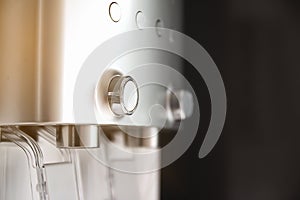 Close-up, electric water purifier button for drinking