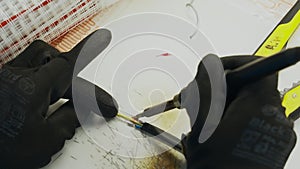 Close up of an electrical soldering wires with special equipment. Creative. Process of repairing wires.