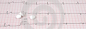Close up Electrocardiogram with pills. Medical concept
