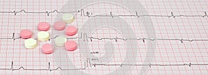 Close up Electrocardiogram with pills. Selective focus