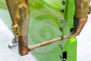 Close up electrode resistance spot welding with robot during simulated position point arc or spark for assembly body frame door