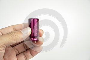 Electrolytic capacitor in hand isolated