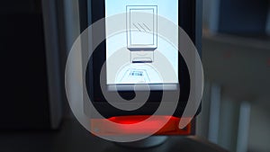 Close up of electronic turnstile with plastic card entering system. Media. Using smartphone with barcode, access control